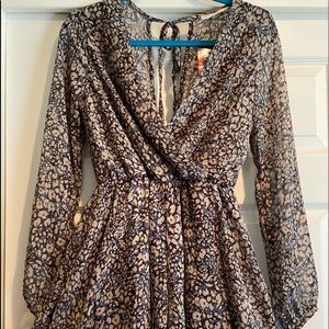 NWT Floral long sleeved romper